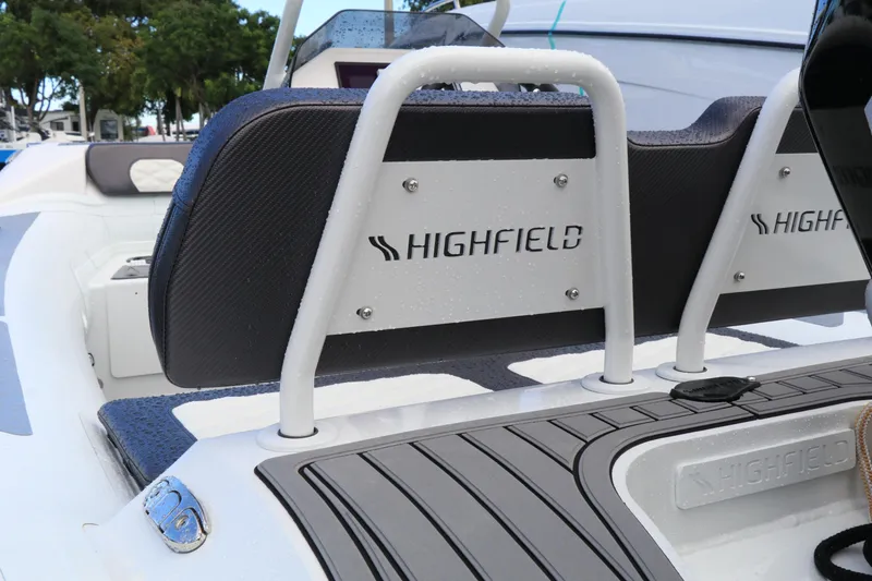 Slide: The Image of 2023 Highfield 390 Sport boat interior with branded seating and sleek design. - 17