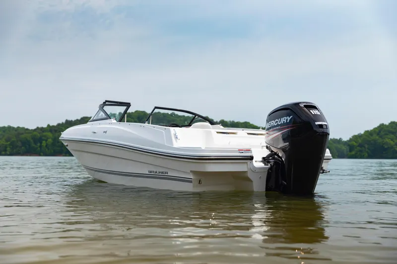Slide: The Image of 2023 Bayliner VR4 OB boat with Mercury outboard engine on calm water. - 21
