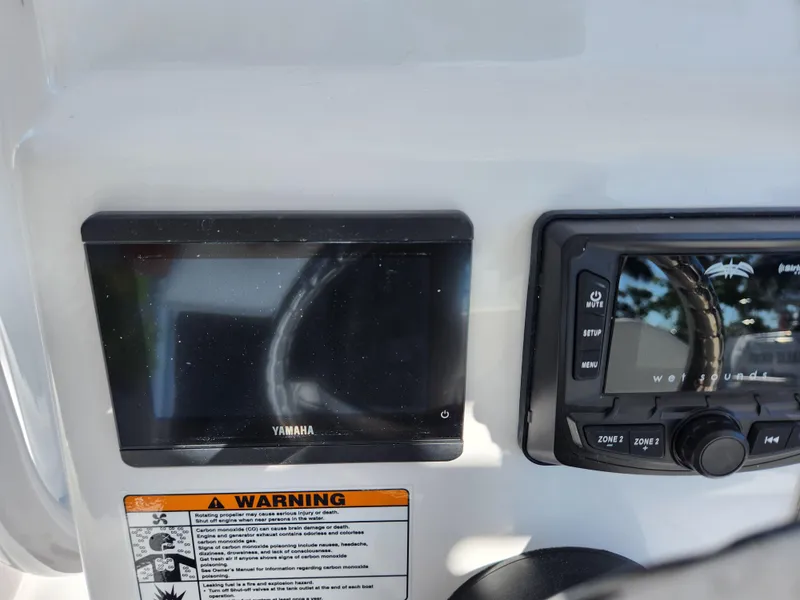 Slide: The Image of Control panel of 2023 Century 2301 Center Console boat with Yamaha display. - 23