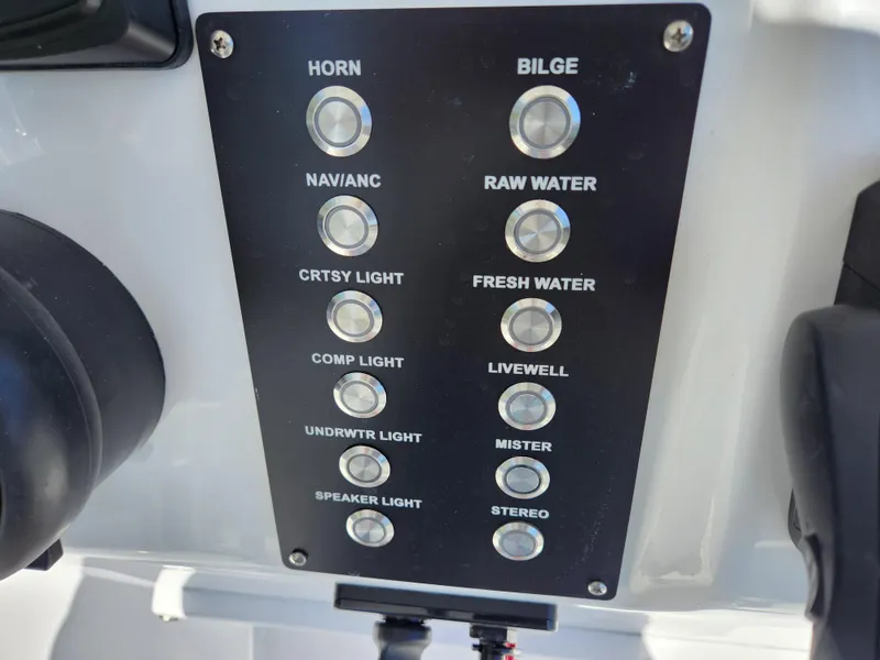 Slide: The Image of 2023 Century 2301 Center Console control panel with various function buttons. - 24