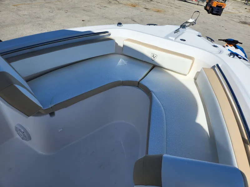 Slide: The Image of 2023 Century 2301 Center Console boat interior with cushioned seating. - 33