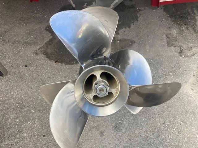 Slide: The Image of Cobalt 246 boat propeller, 2000 model, on concrete surface. - 12