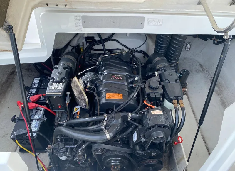 Slide: The Image of Engine compartment of a 2000 Cobalt 246 boat, showcasing detailed mechanical components. - 15