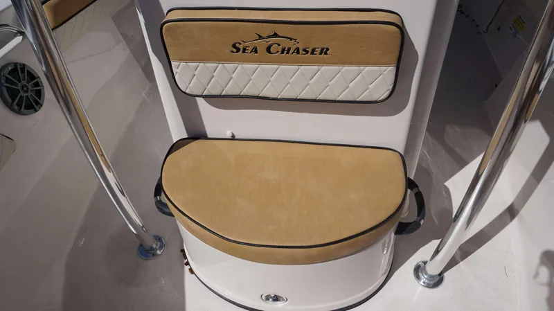 Slide: The Image of 2023 Sea Chaser 20 HFC boat seat with tan and white upholstery. - 13