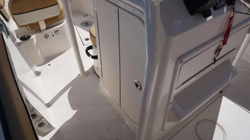 Slide: The Image of 2023 Sea Chaser 22 HFC boat interior with seating and storage compartments. - 17