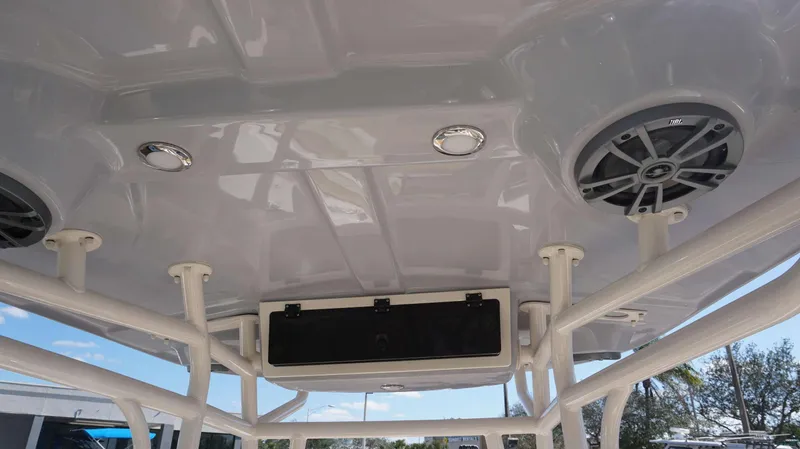 Slide: The Image of 2023 Sea Chaser 22 HFC boat interior with speakers and lighting fixtures. - 19