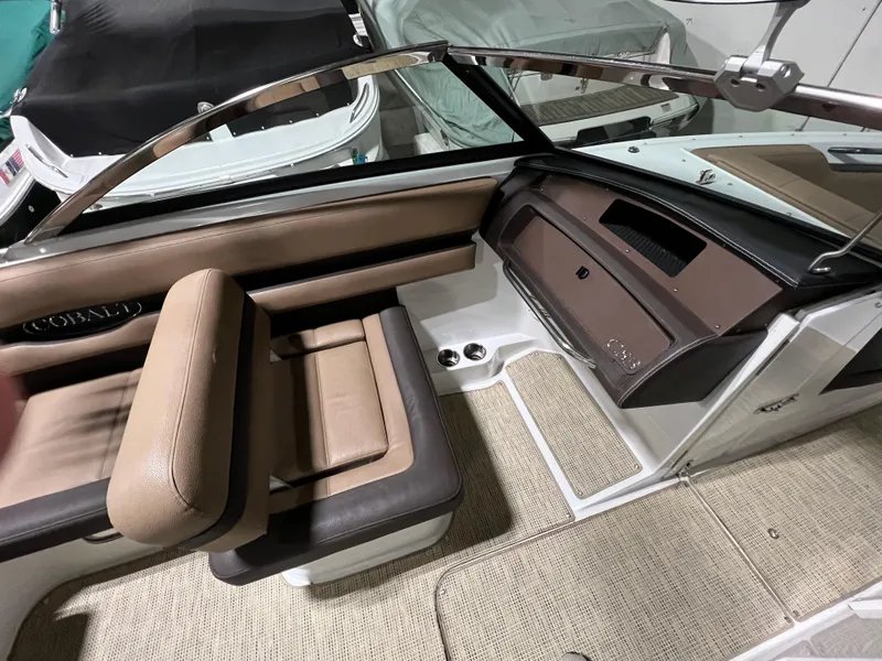 Slide: The Image of 2019 Cobalt CS23 Surf boat in storage facility. - 7