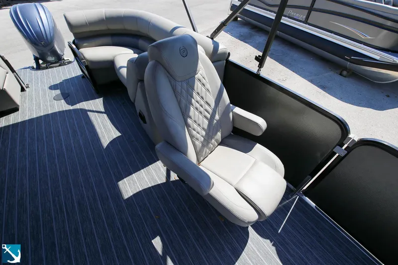 Slide: The Image of 2023 Premier 250 Intrigue RF boat interior with luxurious seating and modern design. - 11