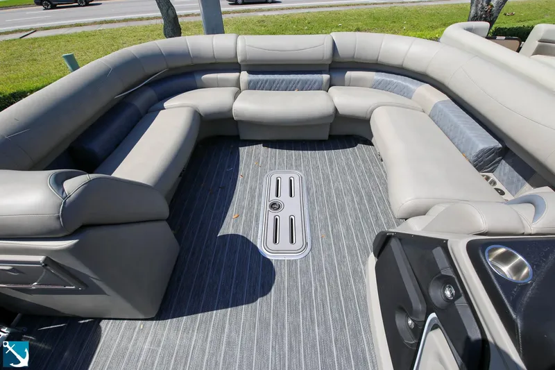 Slide: The Image of 2023 Premier 250 Intrigue RF boat interior with spacious seating and modern design. - 12