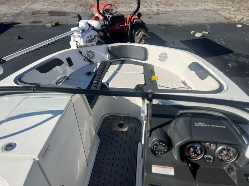 Slide: The Image of 2019 Bayliner VR6 Bowrider I/O interior with dashboard and seating area. - 12