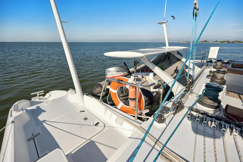 Slide: The Image of Sailing yacht Technologie Marine Entincelle 60, 1999 model, on open water with clear skies. - 22