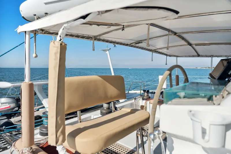 Slide: The Image of Sailing yacht Technologie Marine Entincelle 60, 1999 model, with ocean view and covered seating area. - 34