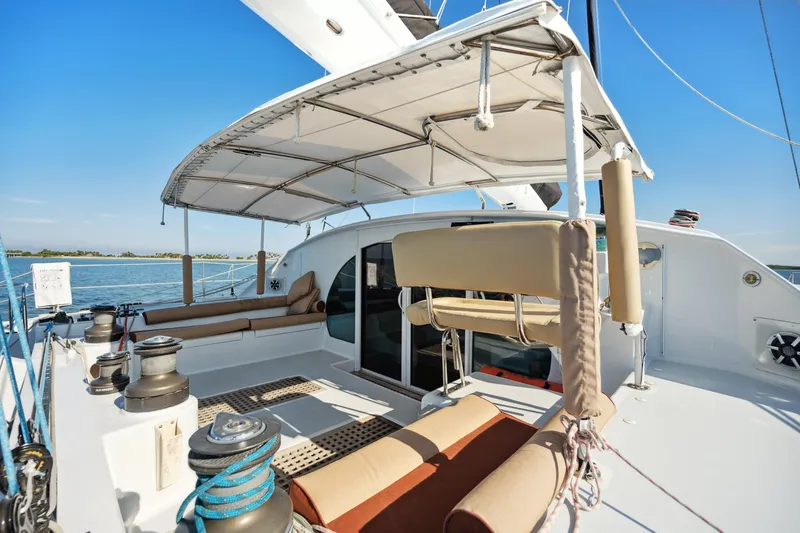 Slide: The Image of Deck view of 1999 Technologie Marine Entincelle 60 yacht with seating and canopy. - 35