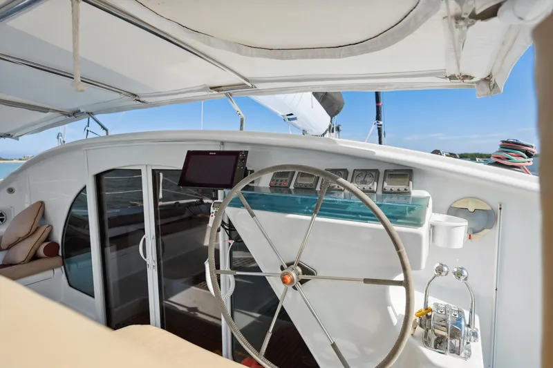 Slide: The Image of Steering wheel and controls of 1999 Technologie Marine Entincelle 60 yacht. - 36