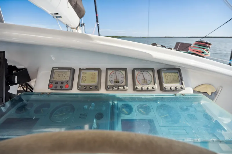 Slide: The Image of Control panel of 1999 Technologie Marine Entincelle 60 yacht with navigation instruments. - 38