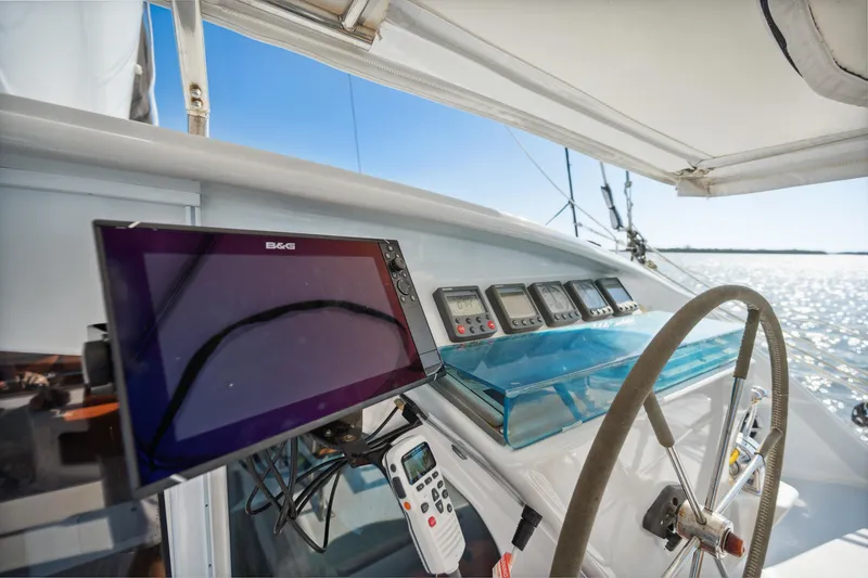 Slide: The Image of Cockpit of 1999 Technologie Marine Entincelle 60 yacht with navigation equipment. - 40
