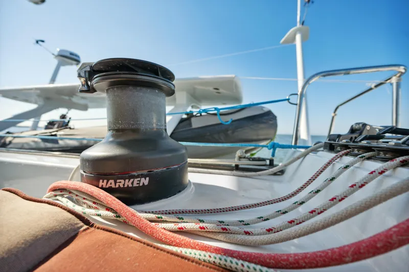 Slide: The Image of Close-up of a 1999 Technologie Marine Entincelle 60 sailboat deck with Harken winch. - 44