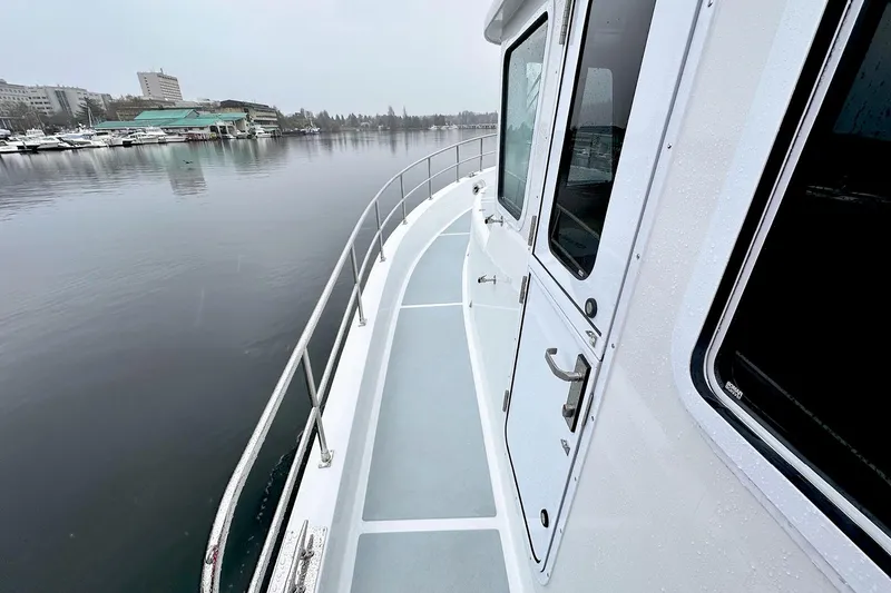 Slide: The Image of Helmsman 46 Pilothouse - Side Deck - 11