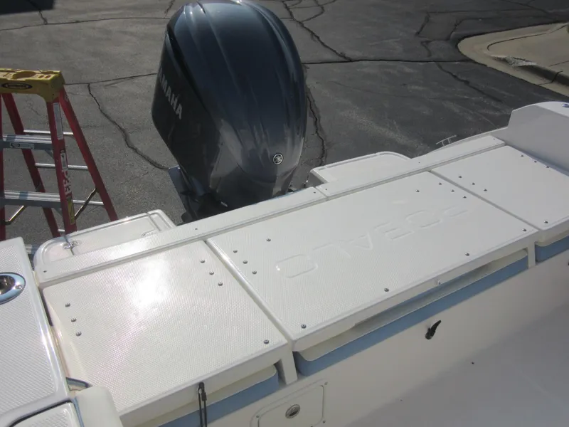 Slide: The Image of 2023 Robalo R230 Center Console boat with Yamaha outboard motor. - 32