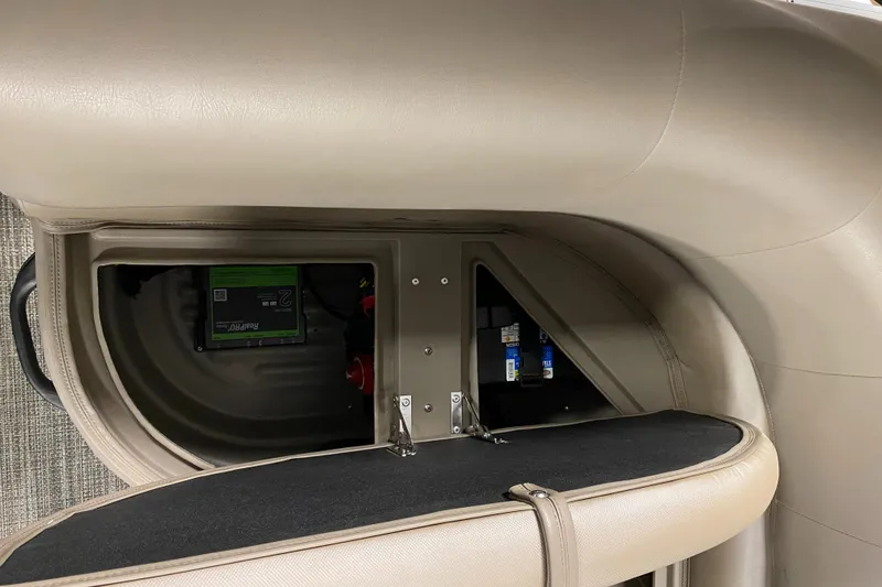 Slide: The Image of Interior view of a 2022 Ranger 200C boat storage compartment. - 13