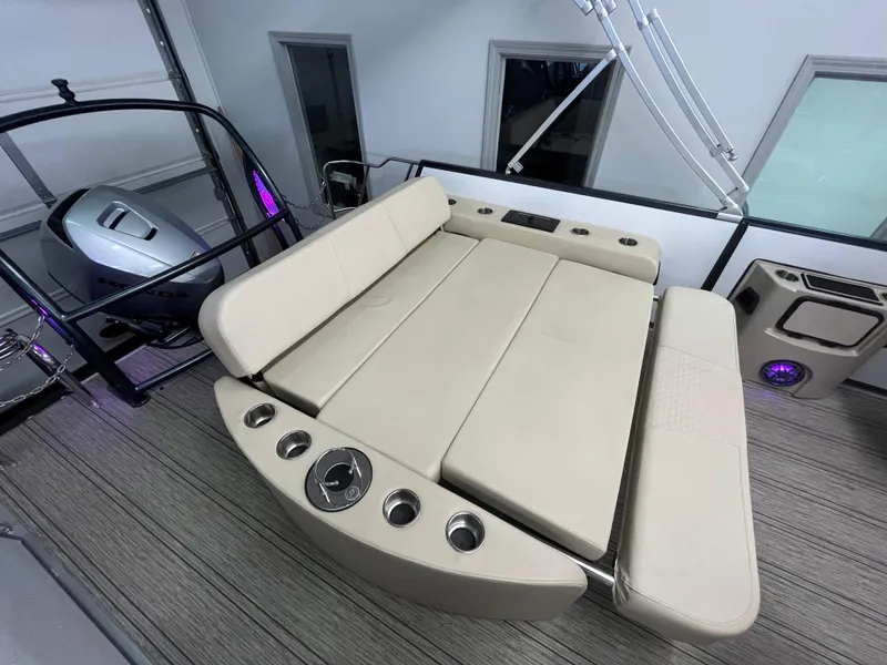 Slide: The Image of 2023 Premier 250 Sunsation boat with beige seating and cup holders. - 7