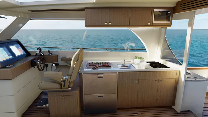 Slide: The Image of Modern yacht interior with helm, kitchen, and ocean view; Legacy 12, 2025 model. - 10