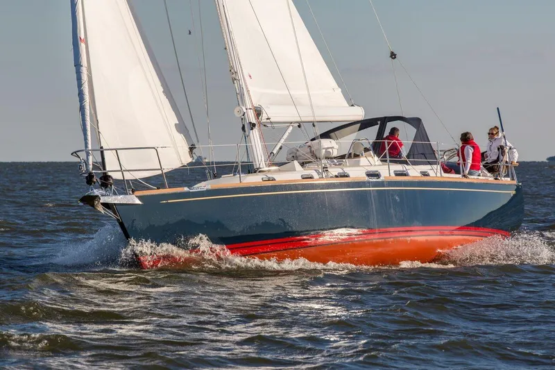 Slide: The Image of Sailing yacht Tartan 395, 2025 model, cruising on open water. - 1