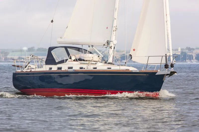 Slide: The Image of Sailing yacht Tartan 395, 2025 model, cruising on open water. - 11