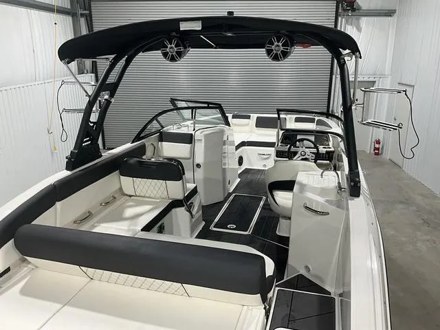 Slide: The Image of 2023 Bayliner DX2250 boat interior with modern seating and sleek design. - 21