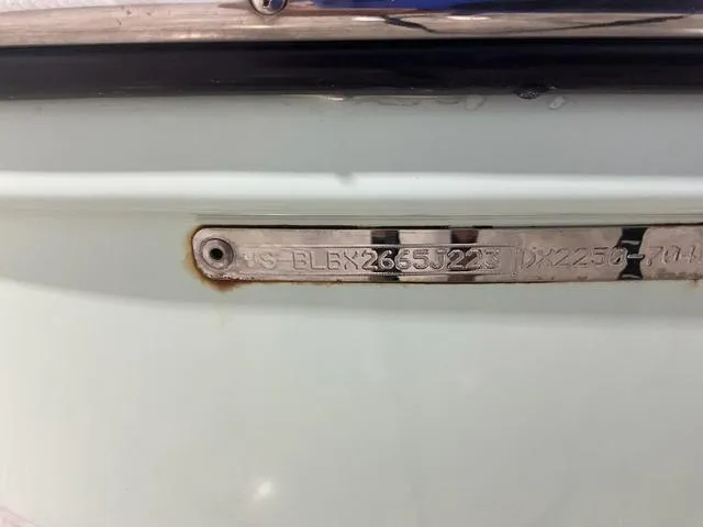 Slide: The Image of 2023 Bayliner DX2250 boat identification plate with serial number. - 22