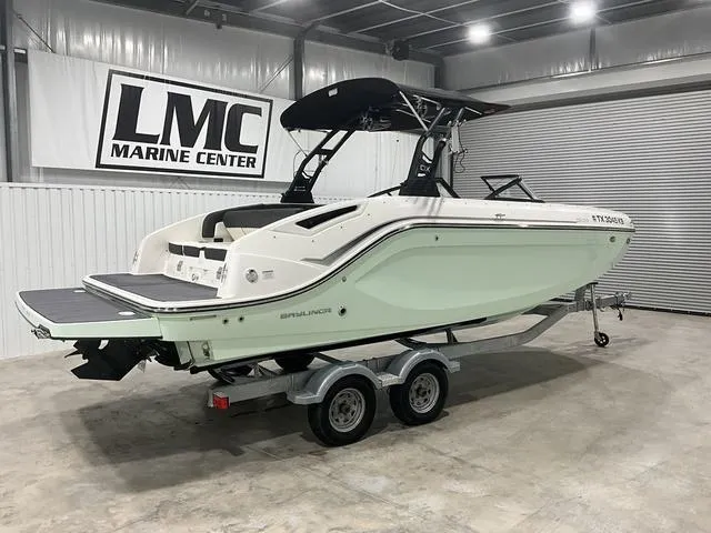 Slide: The Image of 2023 Bayliner DX2250 boat on trailer at LMC Marine Center. - 4