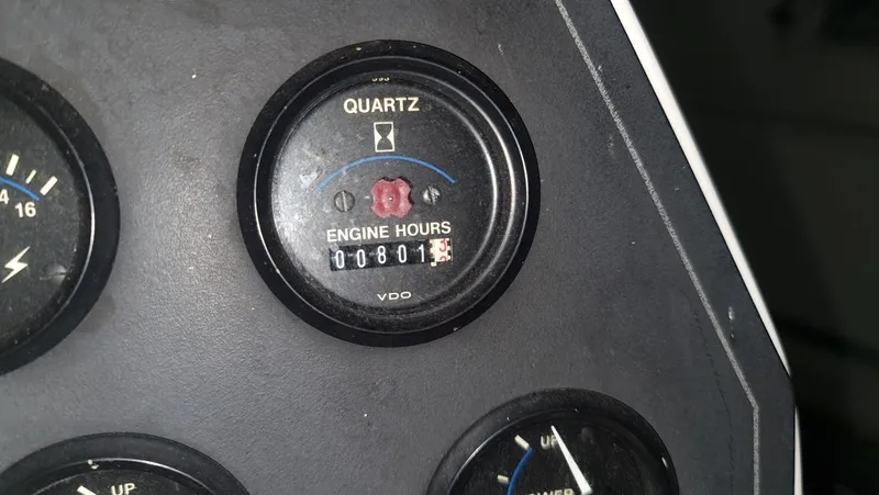 Slide: The Image of 1995 Carver 528 Montego engine hour meter showing 801 hours. - 12