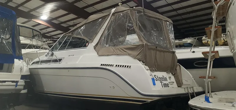 Slide: The Image of 1995 Carver 528 Montego yacht in storage facility. - 2