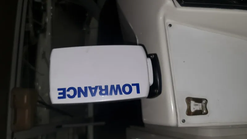 Slide: The Image of Lowrance device on Carver 528 Montego boat, year 1995. - 23