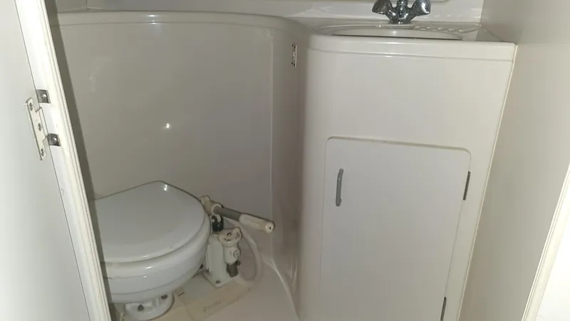 Slide: The Image of Bathroom in 1995 Carver 528 Montego boat. - 18