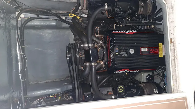 Slide: The Image of Engine compartment of a 1995 Carver 528 Montego boat with MerCruiser engine. - 25