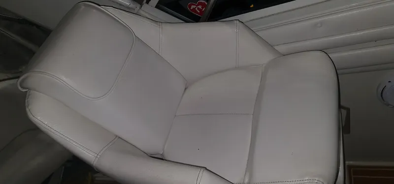 Slide: The Image of Beige leather seat in a 1995 Carver 528 Montego boat. - 8