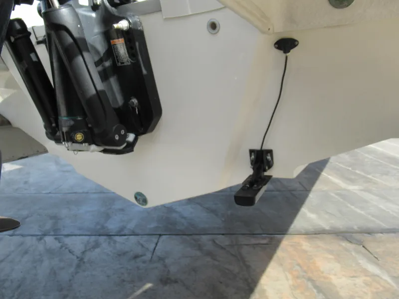 Slide: The Image of Close-up of 2016 Sea Ray SunDeck 220 boat's stern with motor and wiring. - 14