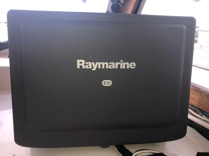 Slide: The Image of Raymarine E120 marine display on Rough Water 37 Sedan, 1981 model. - 25