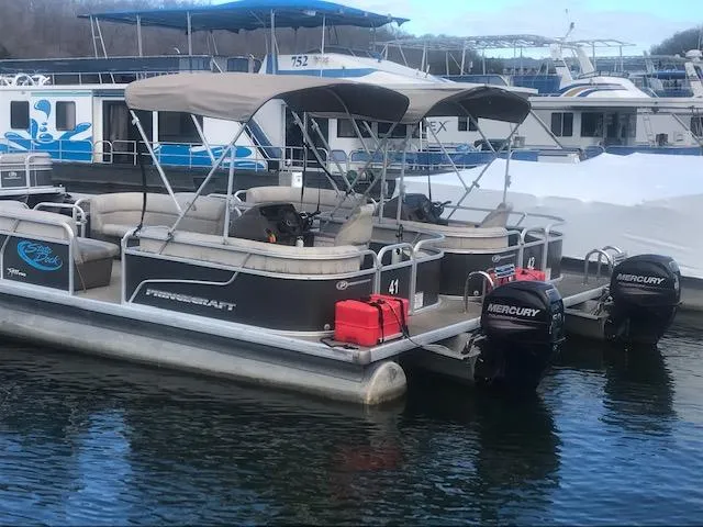 Slide: The Image of 2018 Princecraft Pontoon boat docked with Mercury outboard engines. - 6