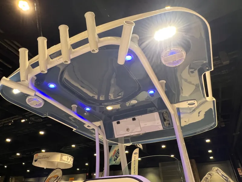 Slide: The Image of 2023 Sea Pro 259 Deep V CC boat with illuminated T-top and rod holders. - 11