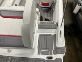 Slide: The Image of 2023 Hurricane SS188 boat interior with gray and red seating and non-slip flooring. - 11