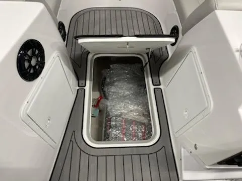 Slide: The Image of 2023 Hurricane SS188 boat interior storage compartment with open hatch. - 14
