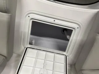 Slide: The Image of Open storage compartment in 2023 Hurricane SS188 boat interior. - 13