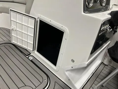Slide: The Image of Open storage compartment on 2023 Hurricane SS188 boat deck. - 17
