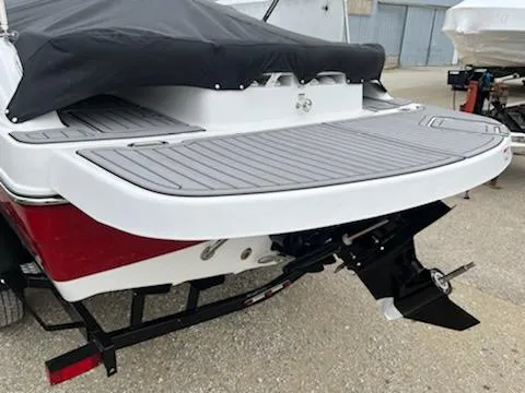 Slide: The Image of 2023 Hurricane SS188 boat with covered deck and outboard motor on trailer. - 3