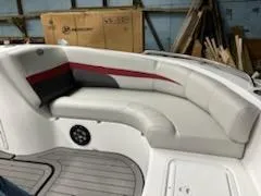 Slide: The Image of 2023 Hurricane SS188 boat interior with cushioned seating and speaker. - 8