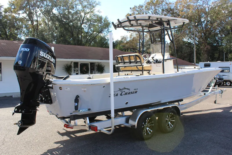 Slide: The Image of 2023 Sea Chaser 26 LX boat with Suzuki 300 outboard motor on trailer. - 4