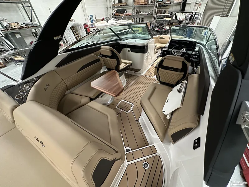 Slide: The Image of 2024 Sea Ray SLX 260 Surf boat interior with luxurious seating and modern design. - 16