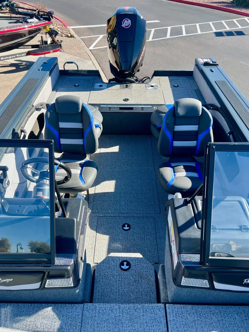 Slide: The Image of 2023 Ranger VX1788 WT fishing boat with dual seats and outboard motor. - 3